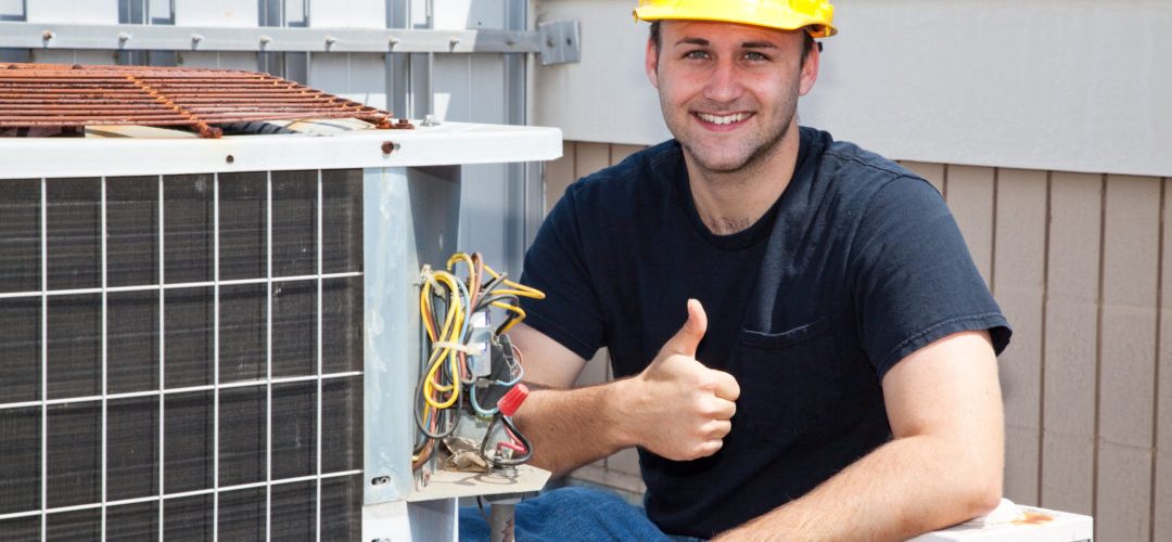 A man sitting beside Air Conditioner